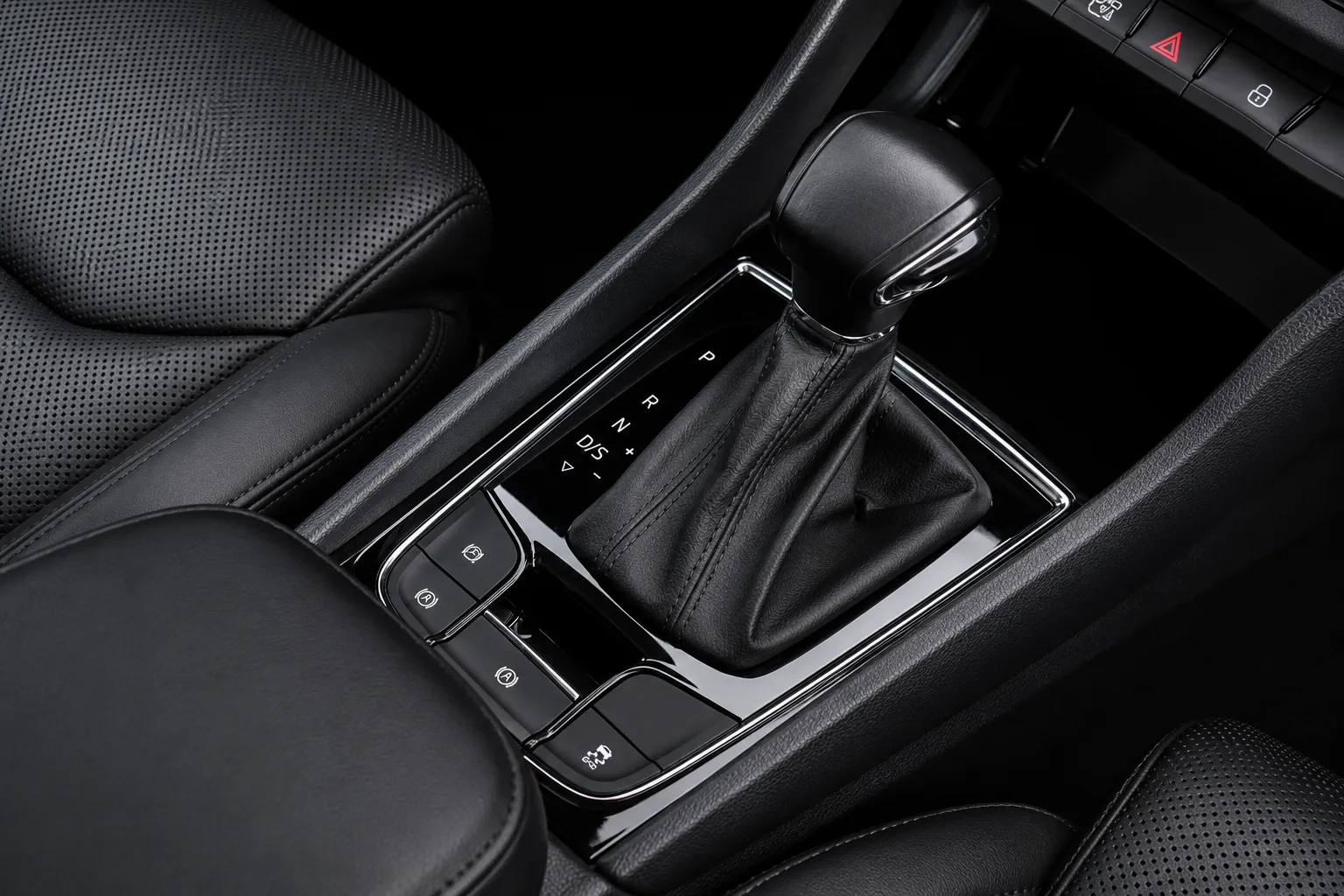 Close-up of a BMW X5 gear selector and center console controls, highlighting the vehicle’s transmission system. This interior view is often associated with diagnosing BMW X5 Transmission Problems, helping owners identify issues affecting shifting performance, responsiveness, and driving comfort.