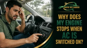 Worried driver checking the AC controls as the engine stops when AC is switched on.