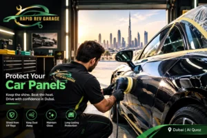 Rapid Rev Garage technician protecting freshly painted Car Panels with professional paint care in Dubai.