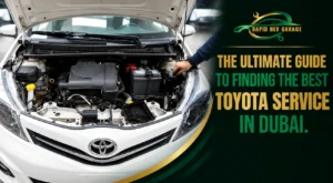 Toyota service in Dubai with a mechanic inspecting a Toyota vehicle engine for maintenance and repair.