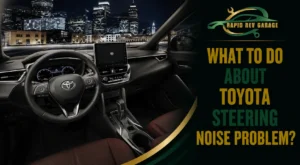 Toyota interior with a steering wheel illustrating a Toyota steering noise problem.